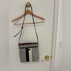 Kate Spade Penn Place Keisha Crossbody purse with beautiful fuchsia interior.